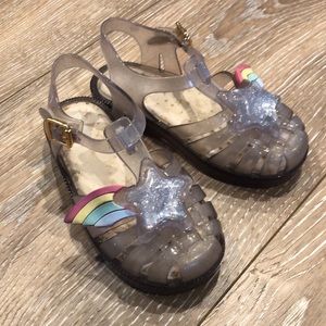 Mini Melissa sparkle rainbow sandals.
